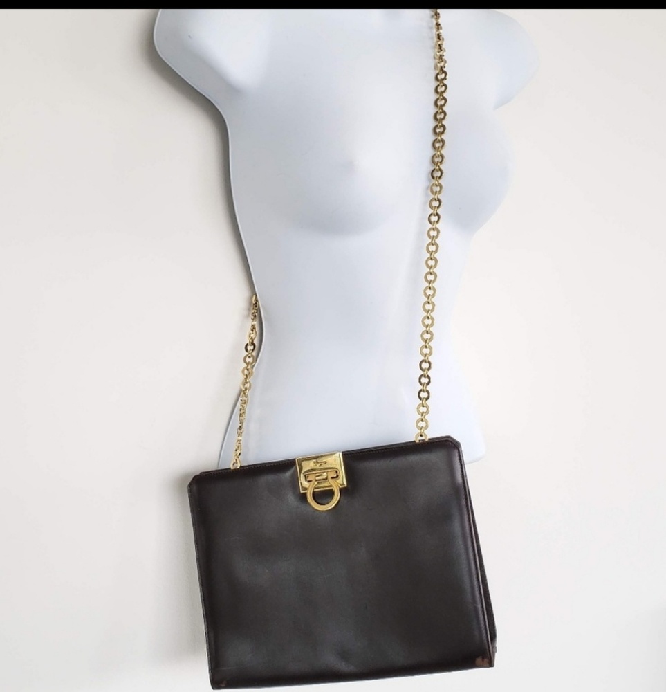 FERRAGAMO leather clutch with gold strap
